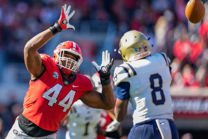 Nov 20, 2021; Athens, Georgia, USA; Georgia Bulldogs defensive lineman Travon Walker (44) rushes Charleston Southern Buccaneers quarterback Jack Chambers (8) during the first half at Sanford Stadium. Mandatory Credit: Dale Zanine-USA TODAY Sports